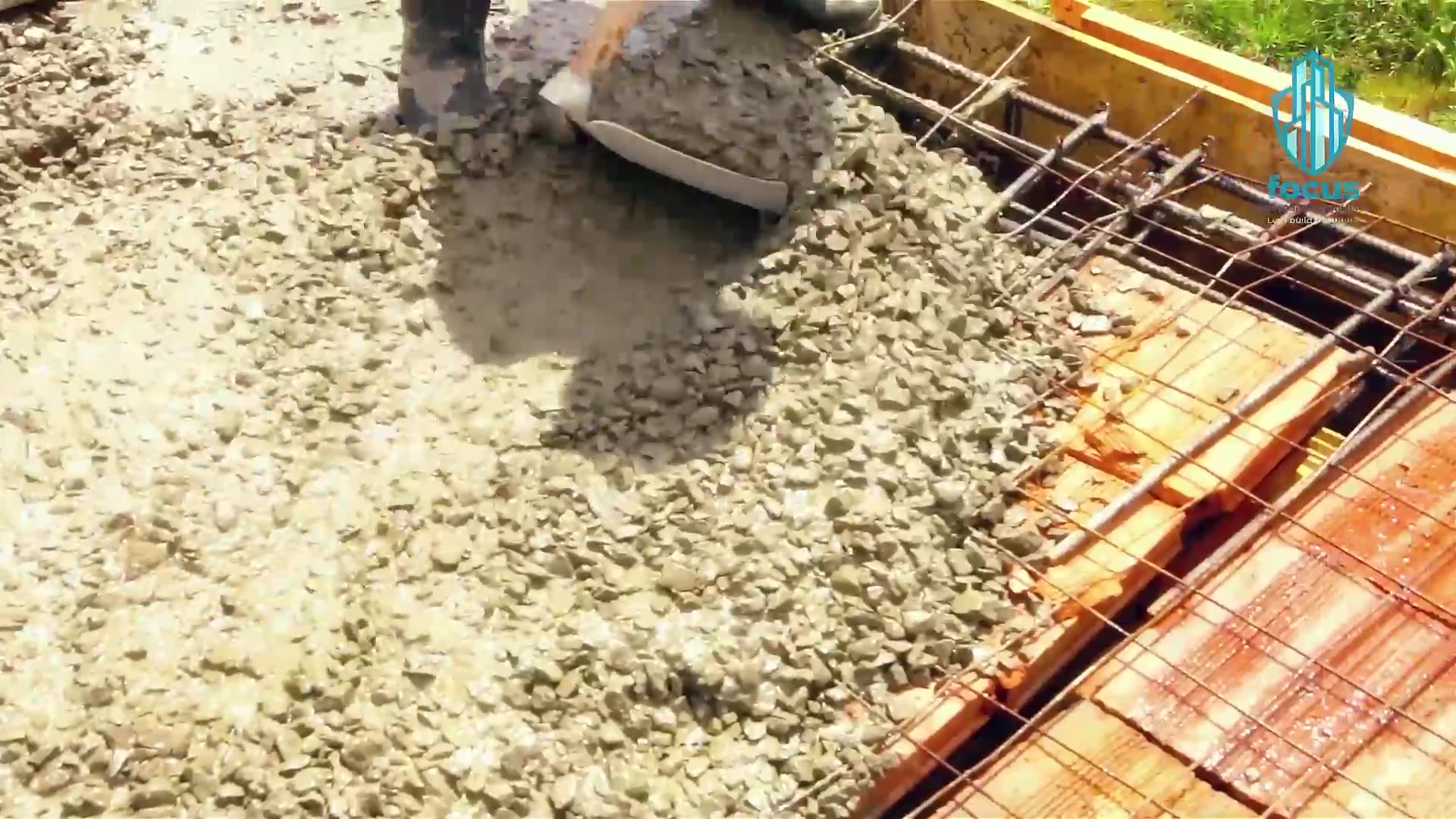 Focus site worker in company overalls